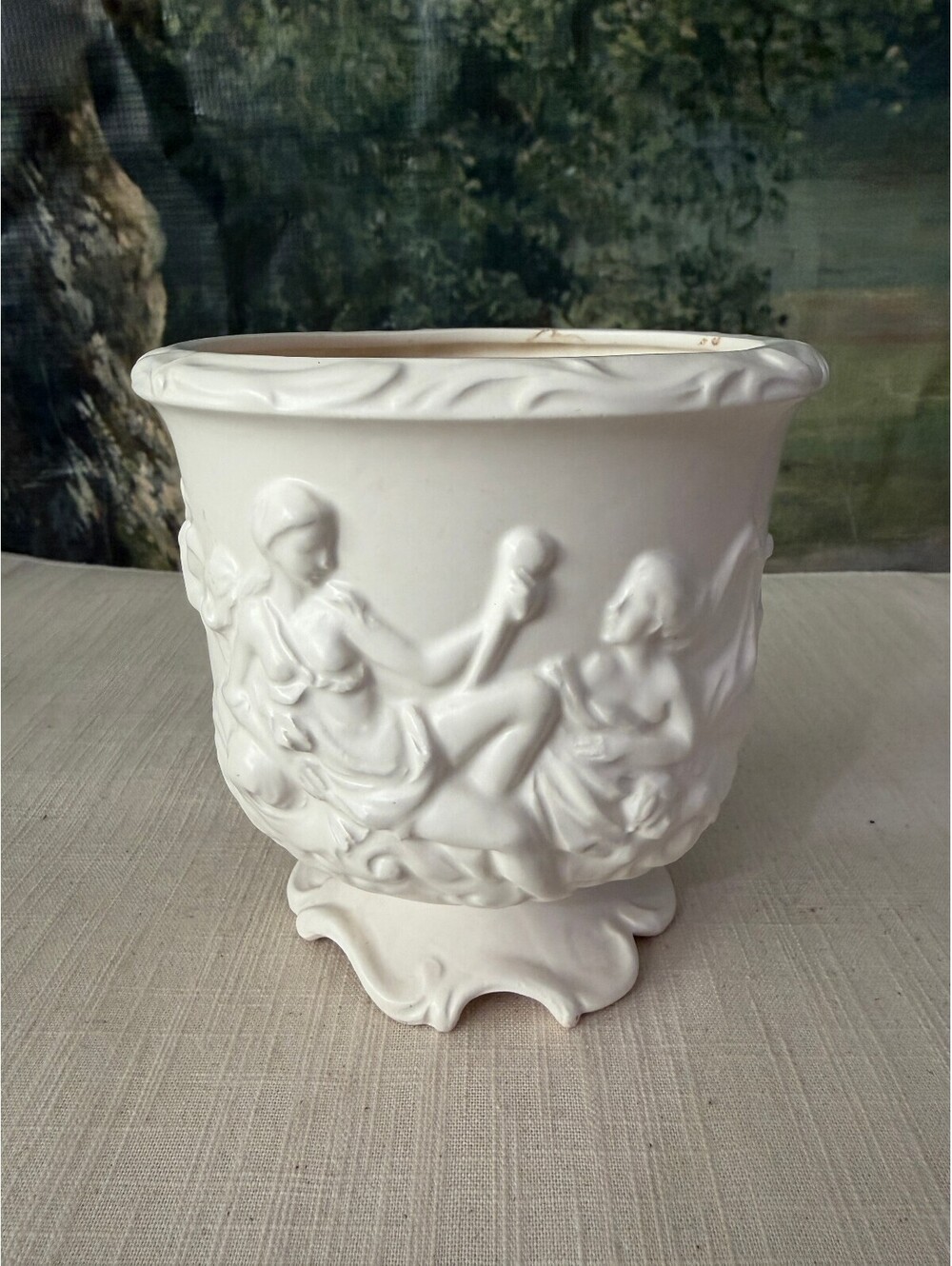 White cherub relief planter